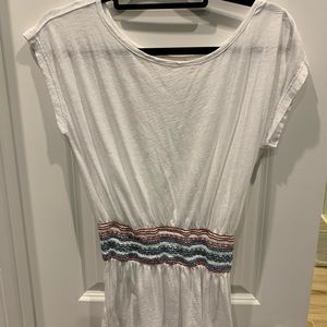 Soft, waist cinching t-shirt.